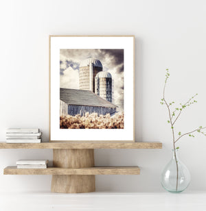 A set of six framed pictures depicting various farm scenes, including silos, windmills, and barns.