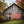 Picturesque Grey Barn with a Red Door in the Fall