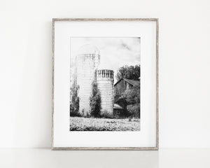 A set of six framed pictures depicting various farm scenes, including silos, windmills, and barns.